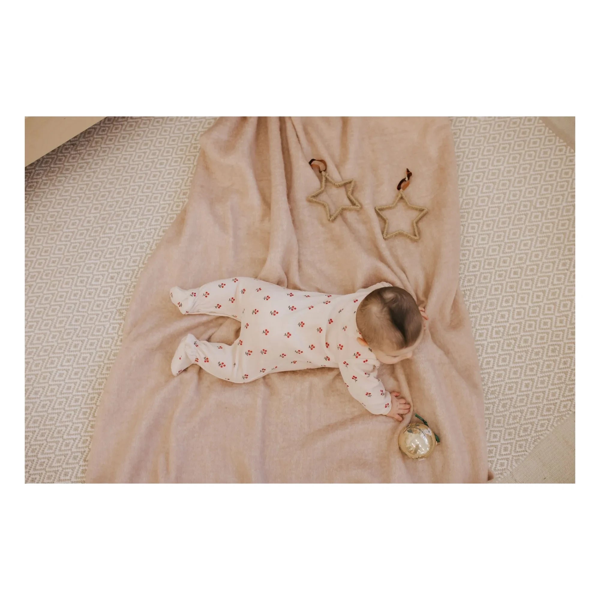 Petit Lem - Pijama con pies estampado floral de algodón orgánico | Rosa pálido