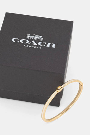 Pulsera metálica Coach para mujer