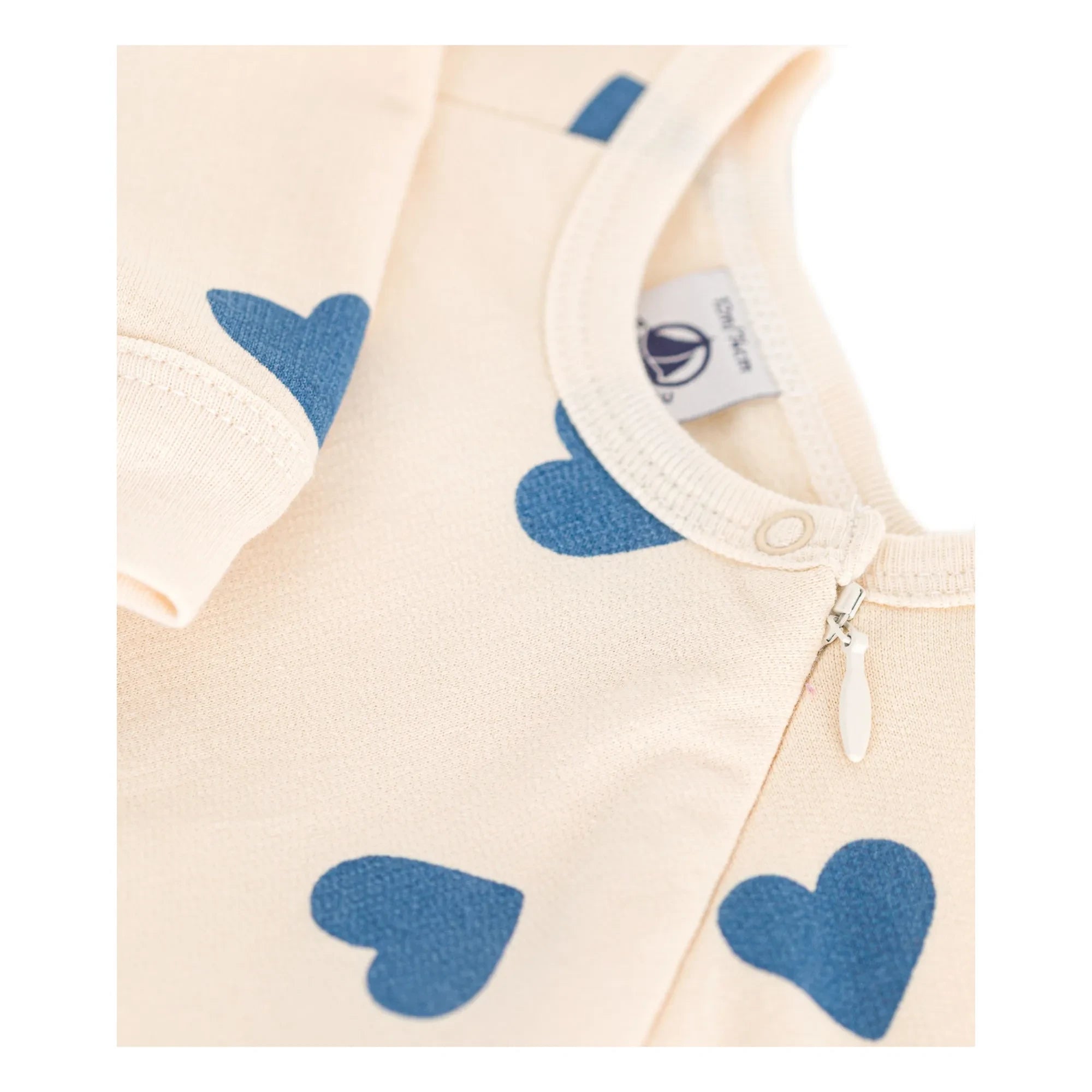 Petit Bateau - Pijama polar con cremallera y capucha con estampado de corazones | Beige