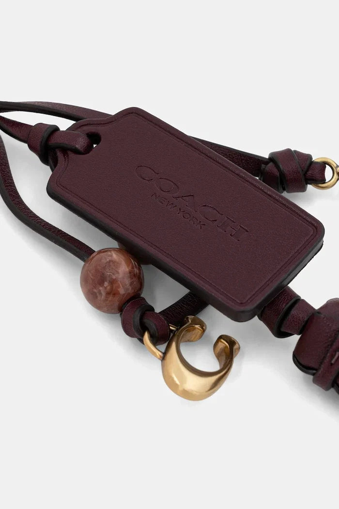 Llavero de cuero Coach