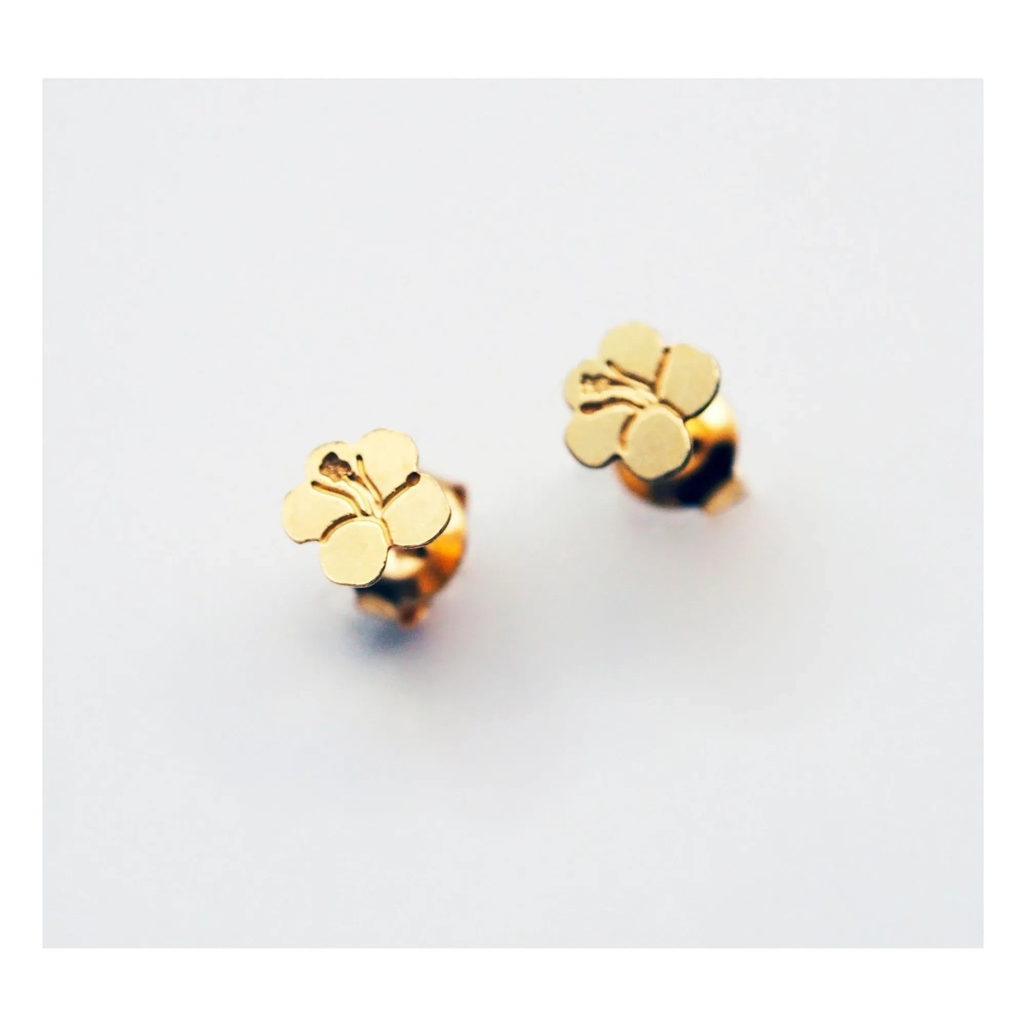 Adorables - Pendientes de hibisco | Dorado