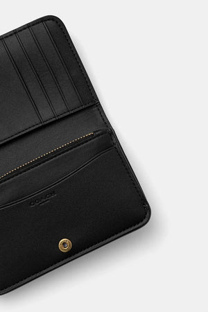 Cartera de cuero Coach para mujer