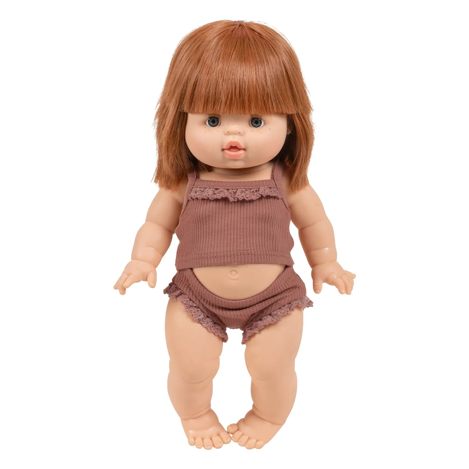 Muñeca de ojos soñolientos Capucine en conjunto de punto de canalé Minikane