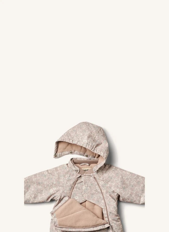 Wheat - Adi Mono de esquí con relleno de fibra reciclada y estampado floral | Rosa pálido