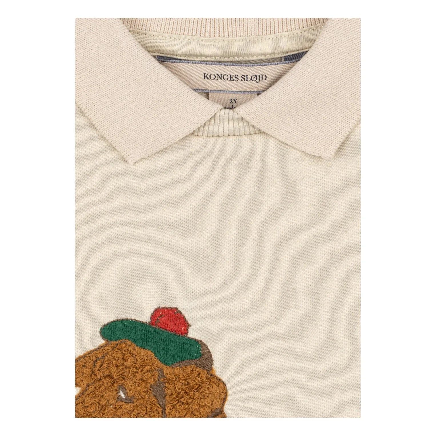 Konges Sløjd - Sudadera con cuello polo con estampado de perro de algodón orgánico | Crudo