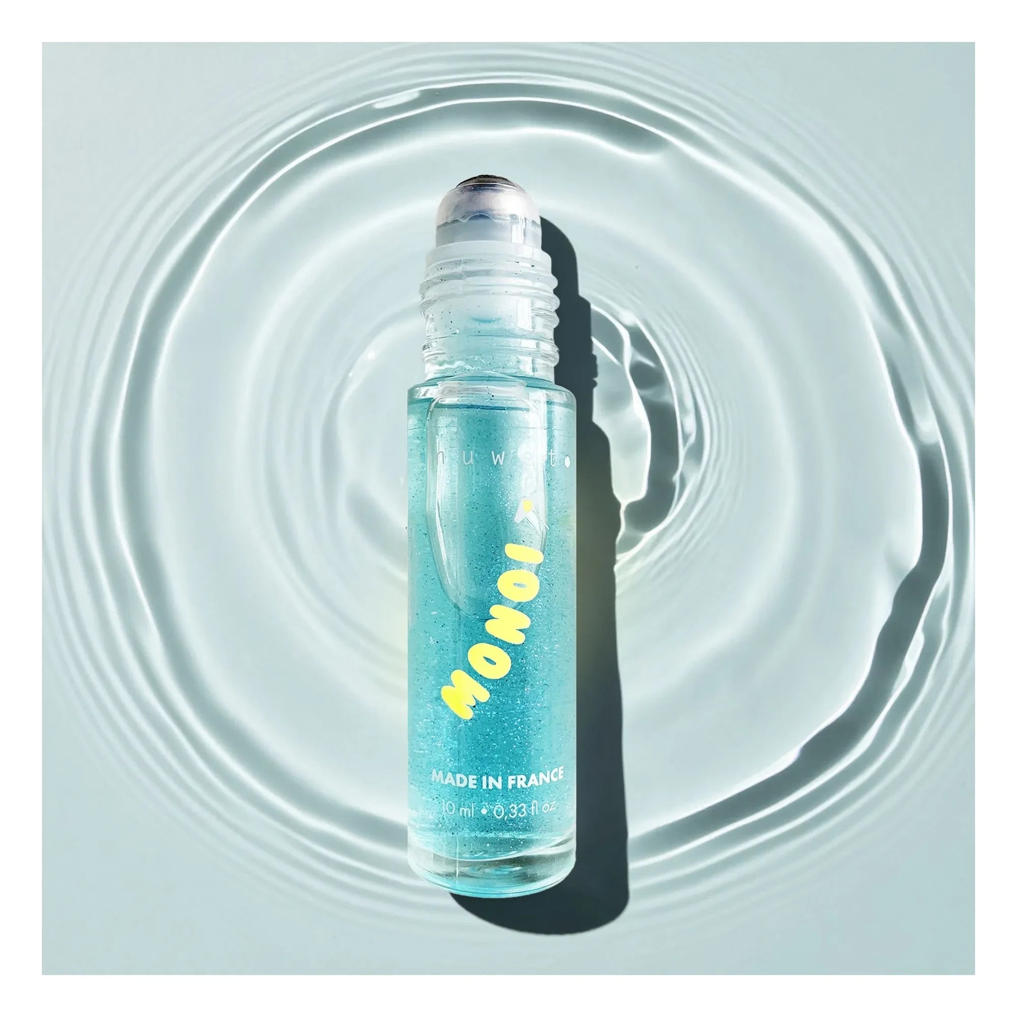 Inuwet - Roll-on Monoï Perfumado con Purpurina - 10 ml