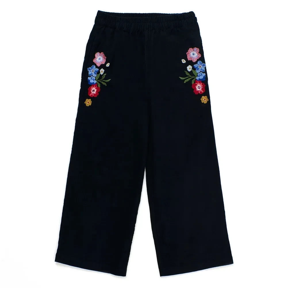 Maison Mangostan - Pantalones de terciopelo con estampado floral | Negro