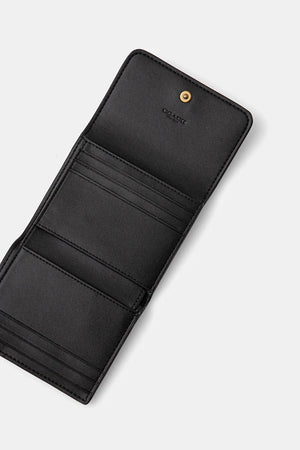 Monedero de cuero Coach para mujer