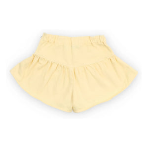 the new society - Bellis Denim Pantalón Corto Volantes | Amarillo pálido
