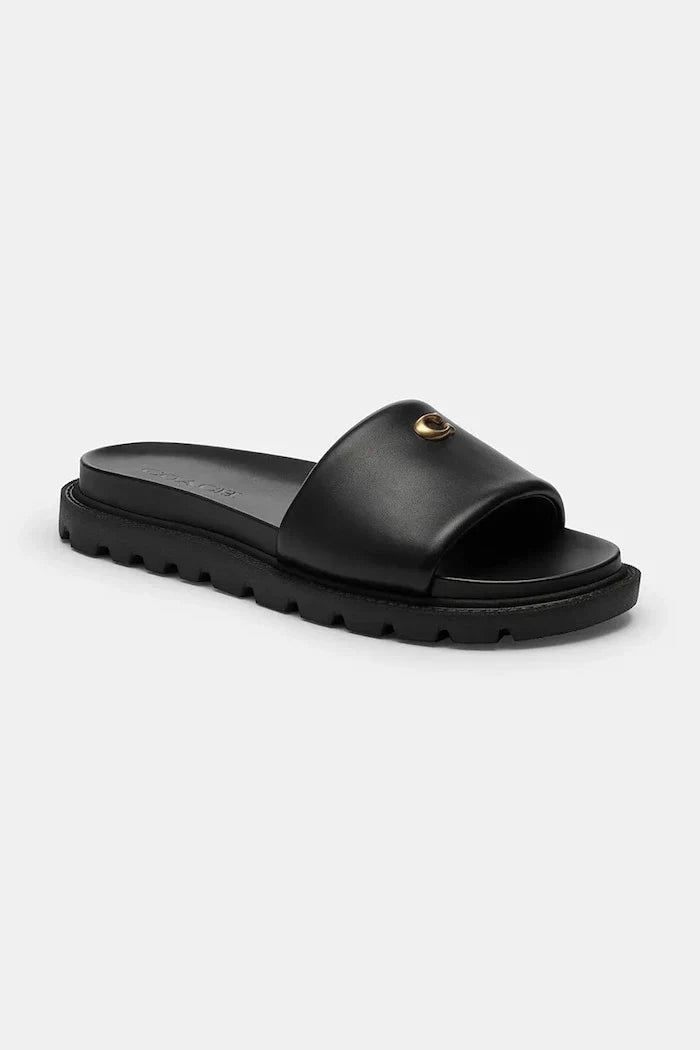Sandalia plana de cuero Coach Brynn Leather Slide para mujer