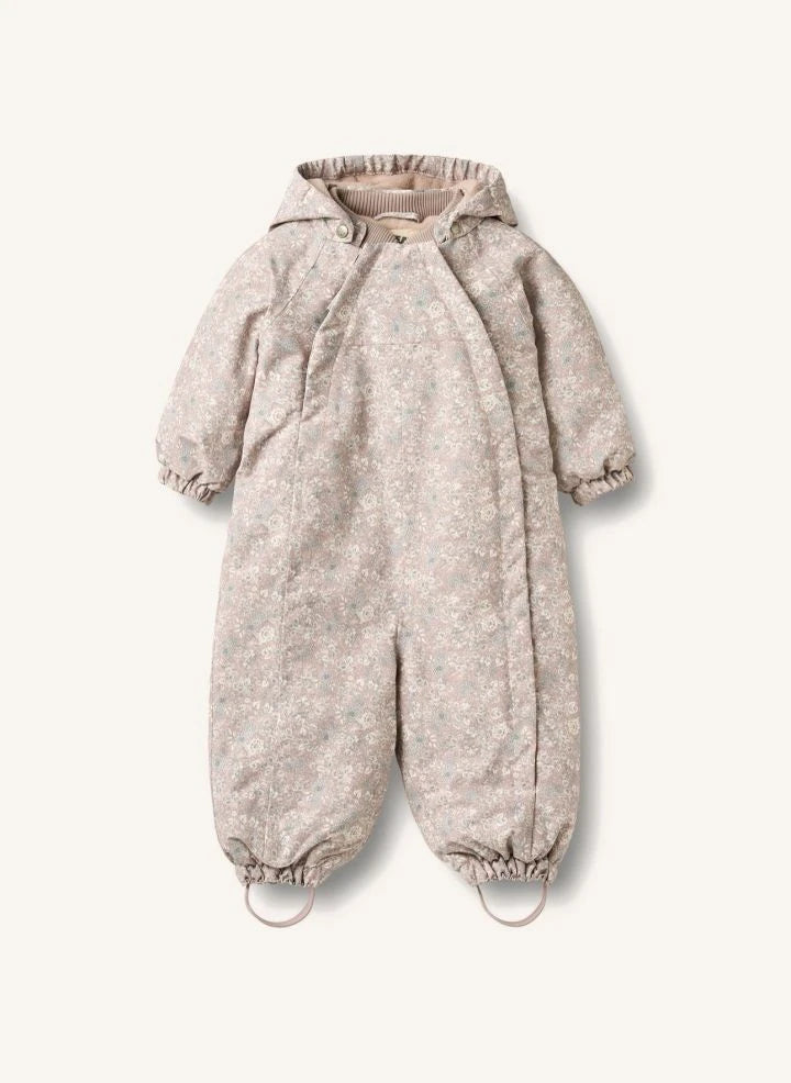 Wheat - Adi Mono de esquí con relleno de fibra reciclada y estampado floral | Rosa pálido