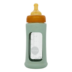 Hevea - Biberón de vidrio de boca ancha con flujo medio y funda protectora | Verde almendra