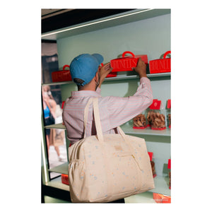 Nobodinoz - Bolso cambiador impermeable Opera Orange Cherries | Beige