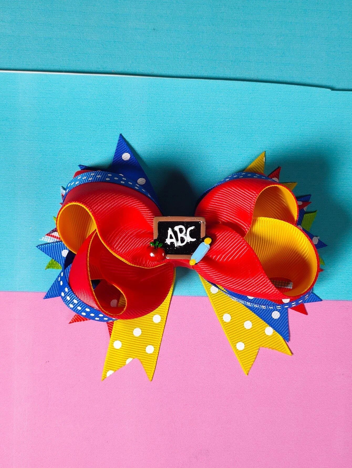 Dinossi - Pinza de pelo para niña con diseño ABC escolar