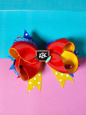 Dinossi - Pinza de pelo para niña con diseño ABC escolar