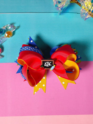 Dinossi - Pinza de pelo para niña con diseño ABC escolar