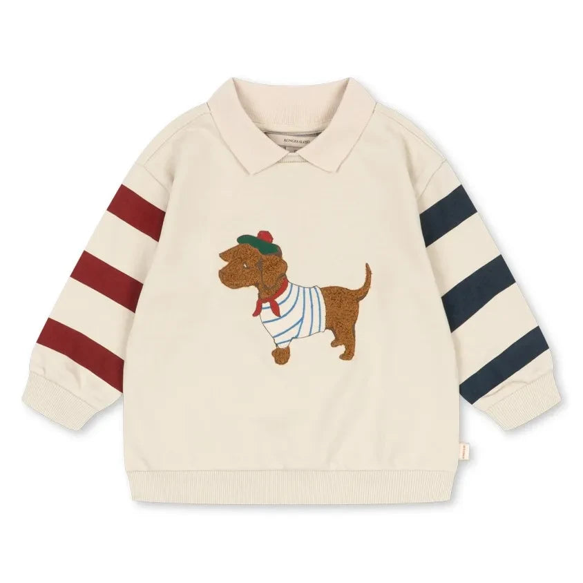 Konges Sløjd - Sudadera con cuello polo con estampado de perro de algodón orgánico | Crudo