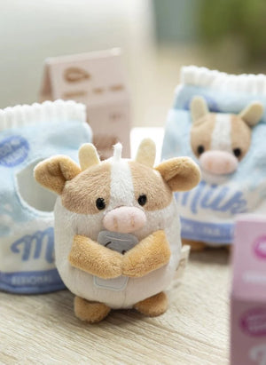 Nici - Juguete de peluche Moono la vaca, con disfraz de cartón de leche | Beige