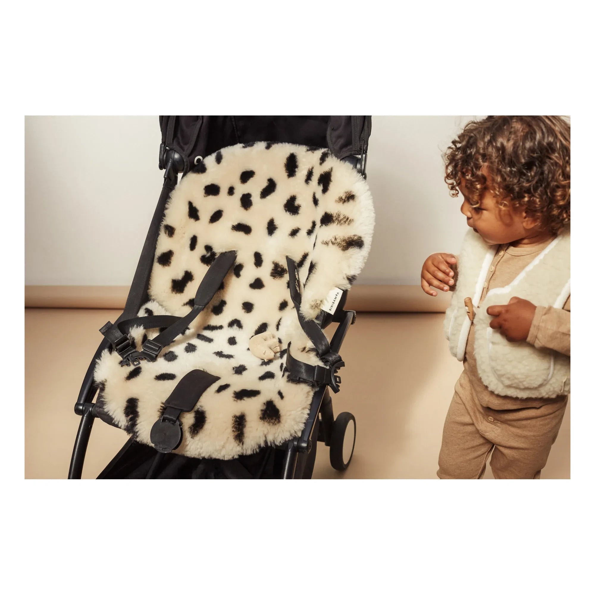 BINIBAMBA - Cojín de piel de oveja para cochecito o moisés | Leopardo