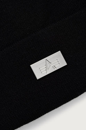 Gorro de punto de Alpha Industries con etiqueta metálica