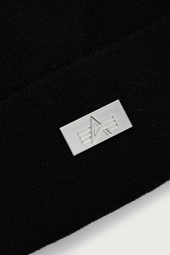 Gorro de punto de Alpha Industries con etiqueta metálica