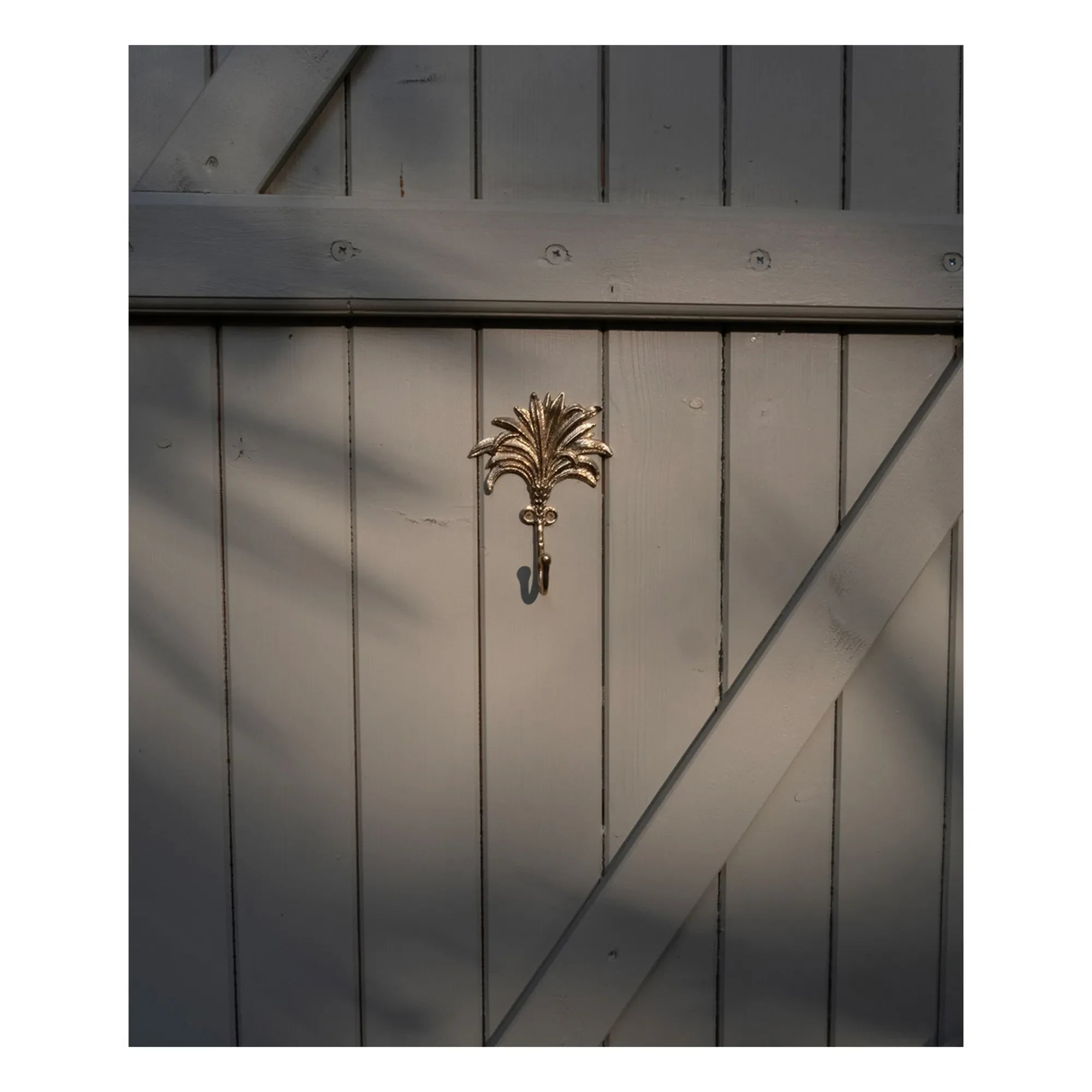 Doing Goods - Colgador de pared de latón Marlin | Dorado