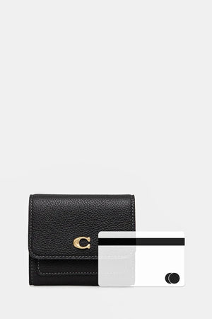 Monedero de cuero Coach para mujer