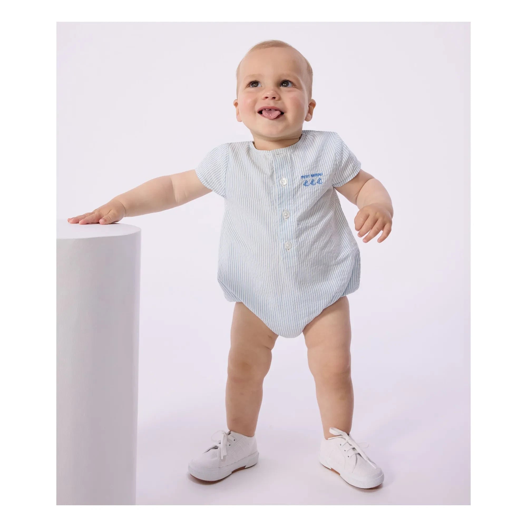Petit Bateau - Mono de algodón orgánico seersucker a rayas | Azul claro