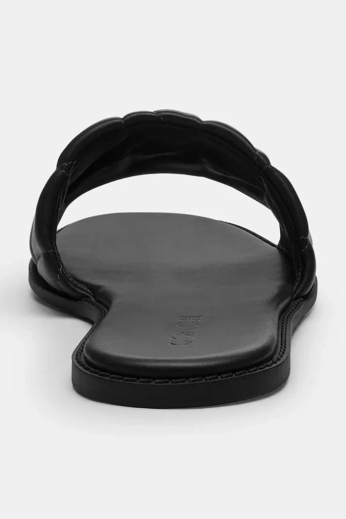 Sandalias planas de cuero acolchadas para mujer Coach Holly