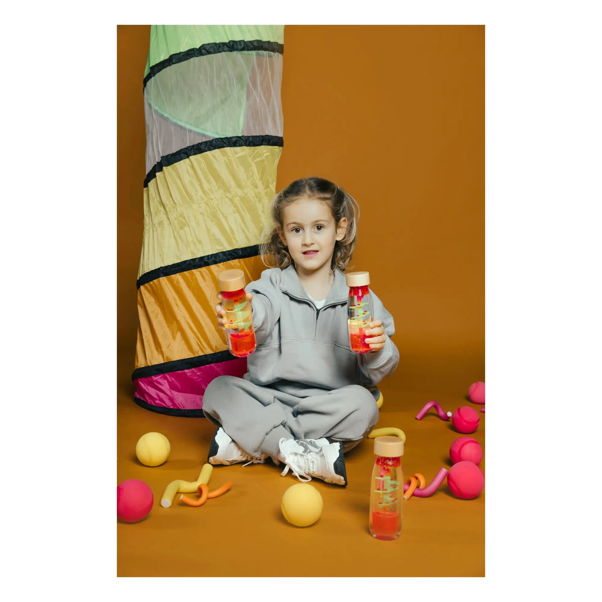 Petit Boum - Botella sensorial espiral | Rosa caramelo
