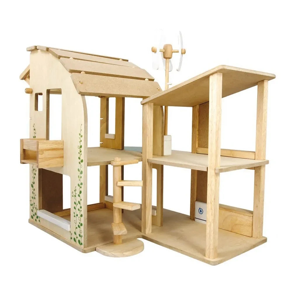 Plan Toys - Casa de muñecas amueblada ecológica