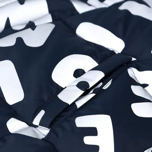 Liewood - Chaqueta de plumón Adelina con letras reflectantes Hecha de fibras recicladas | Azul marino