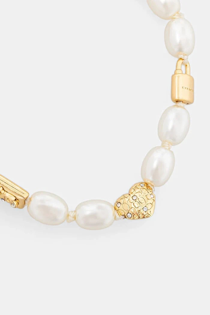 Pulsera metálica de mujer Coach