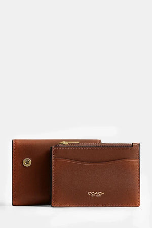 Tarjetero de cuero tipo cartera Coach para mujer