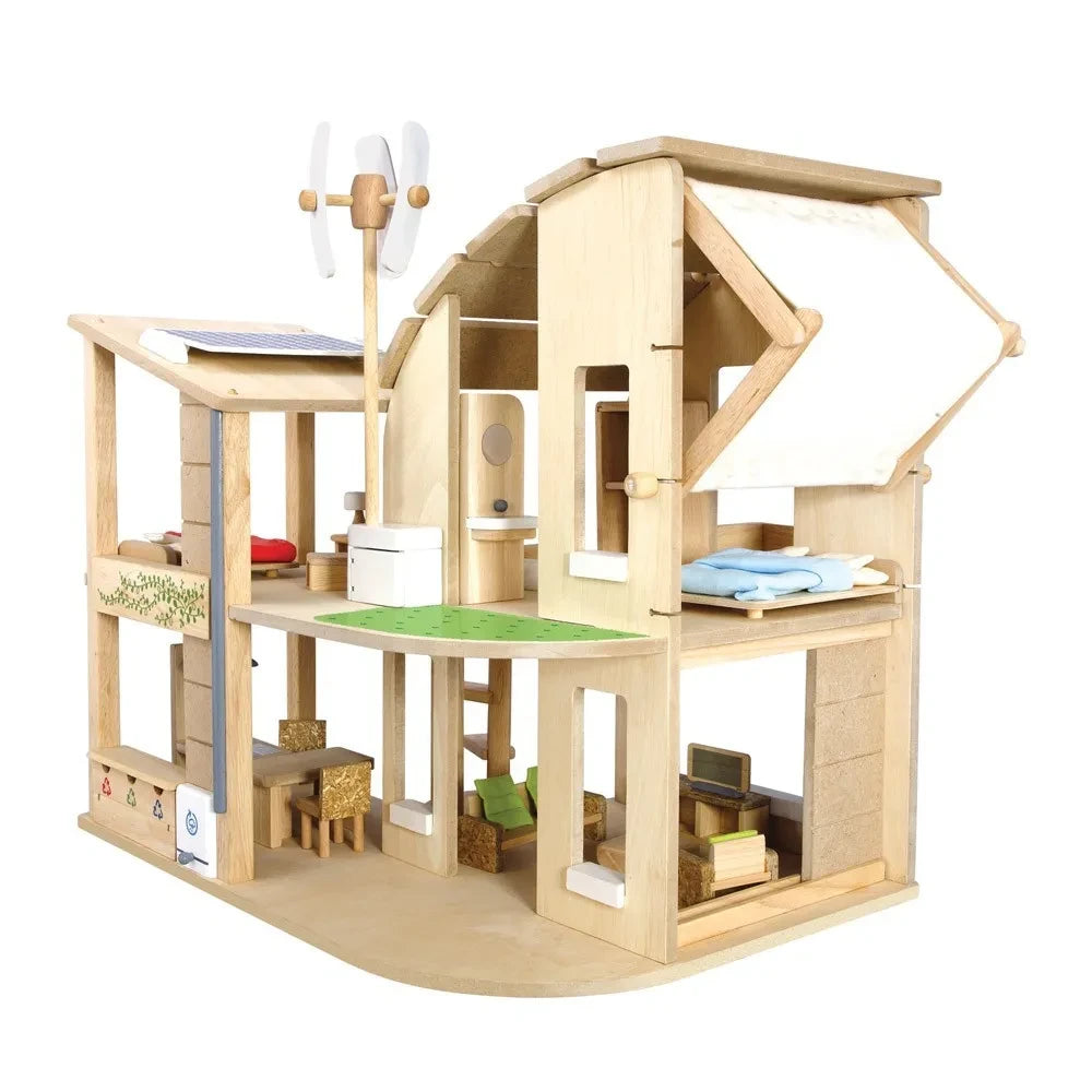Plan Toys - Casa de muñecas amueblada ecológica