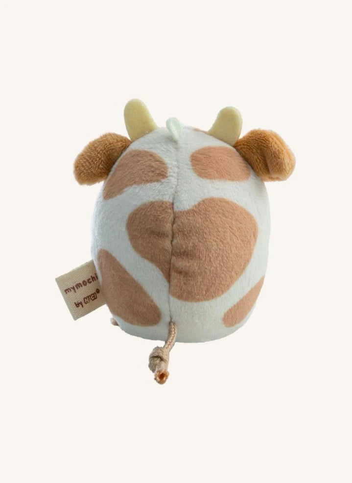 Nici - Juguete de peluche Moono la vaca, con disfraz de cartón de leche | Beige