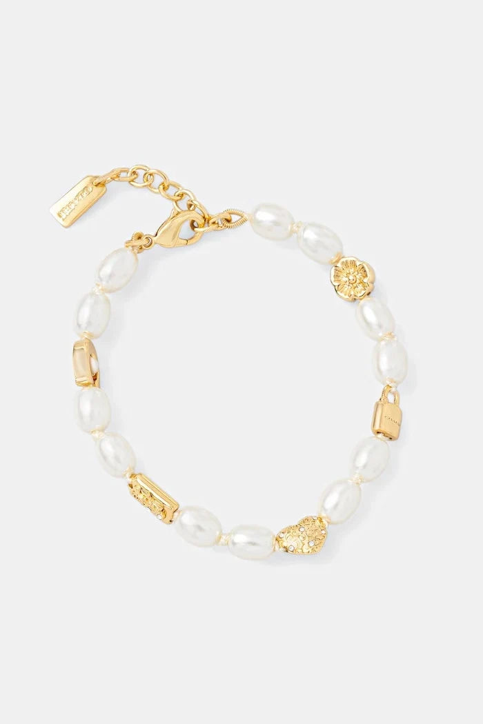 Pulsera metálica de mujer Coach