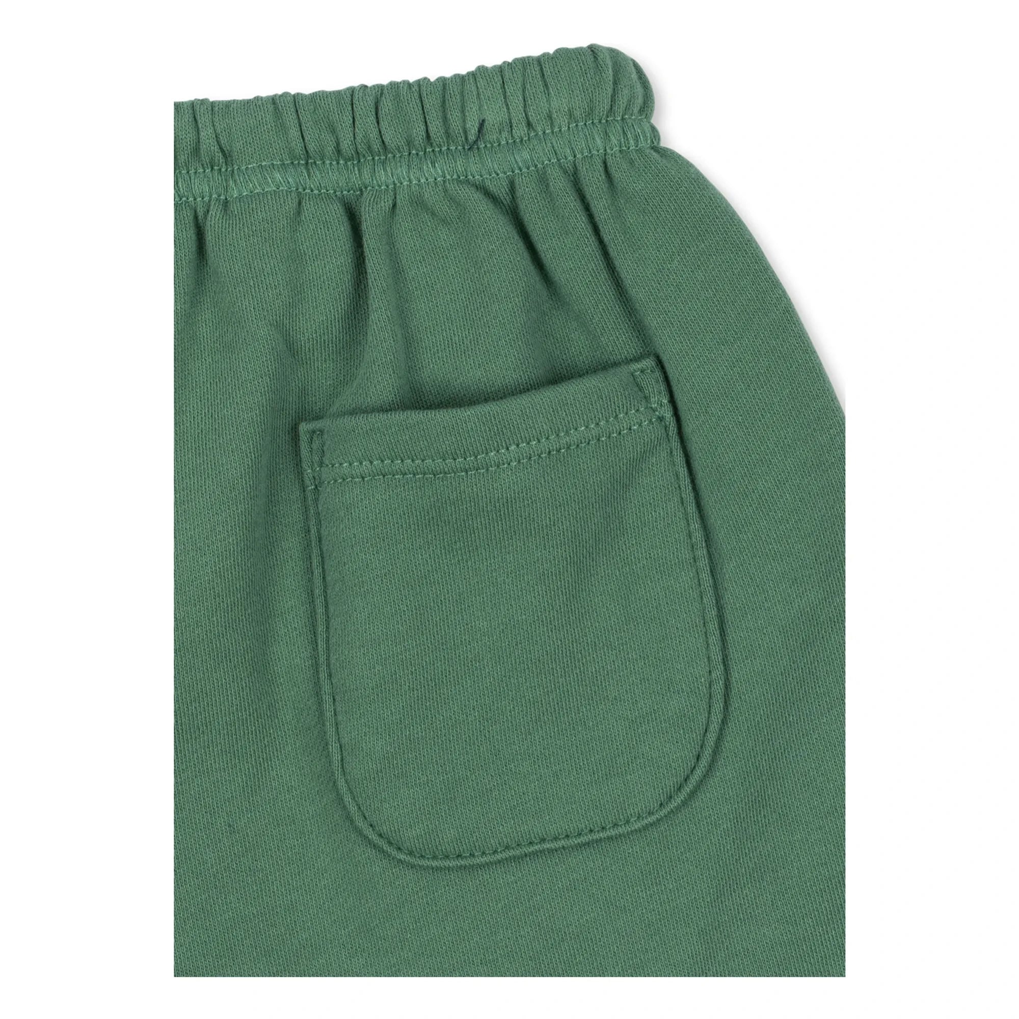 Konges Sløjd - Pantalones cortos de chándal con puntos de algodón orgánico unisex | Verde