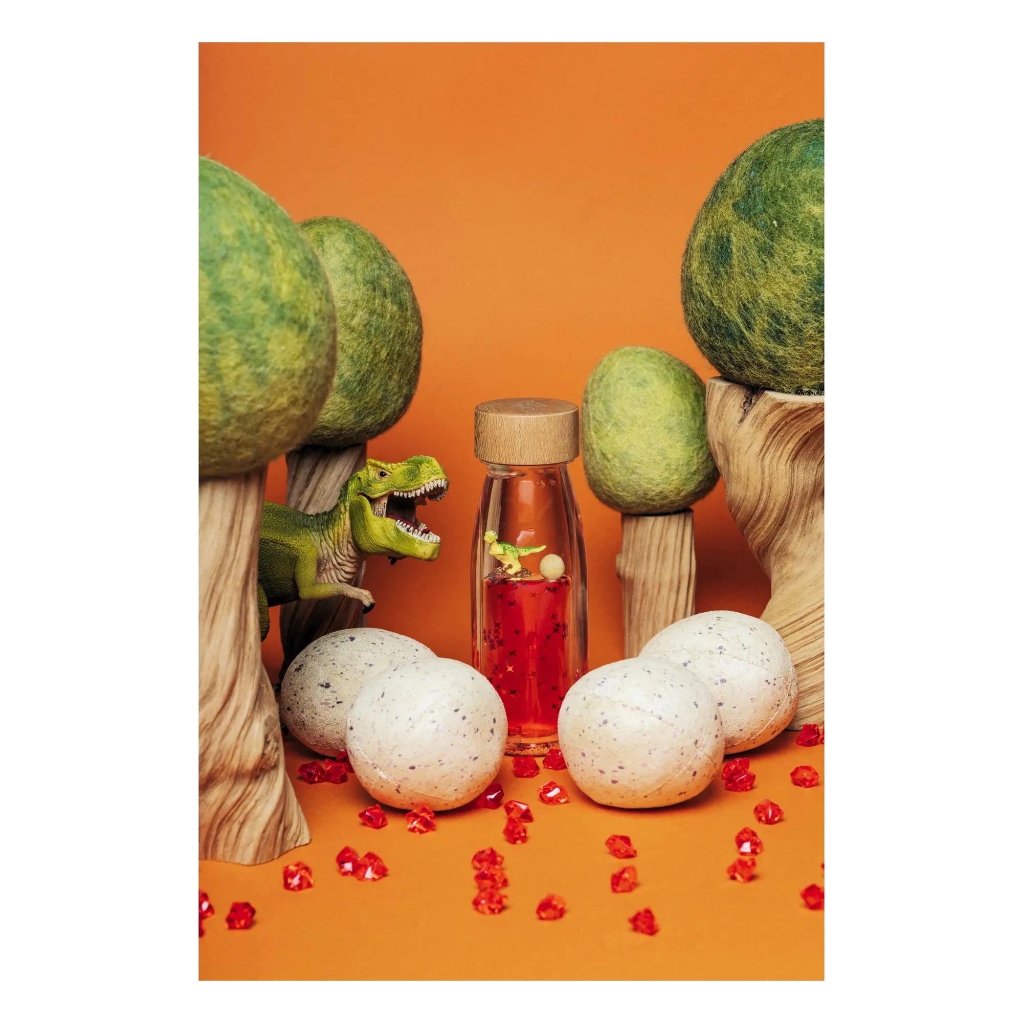 Petit Boum - Botella sensorial T-Rex | Naranja