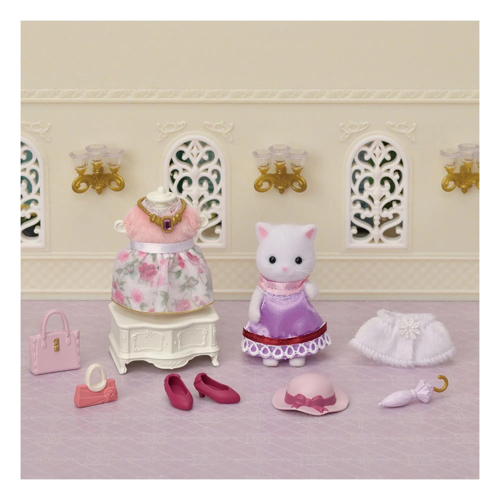 Sylvanian Families - Maleta de moda y hermana mayor Gata Persa