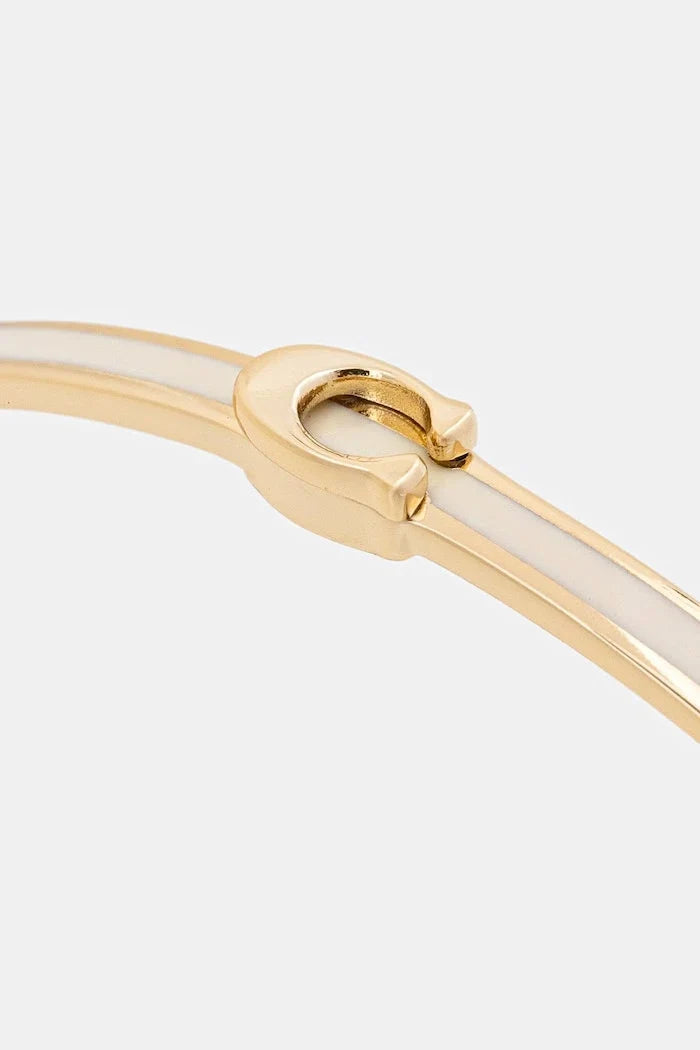 Pulsera metálica Coach para mujer