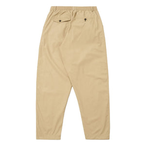 Universal Works - Pantalón de chándal plisado de poliéster técnico | Beige