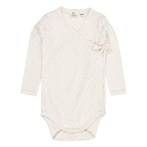 Copenhagen Colors - Body de algodón orgánico con cuello cruzado y punto calado | Crema