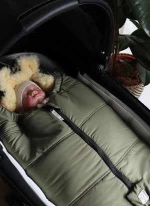 Kaiser - Forro para asiento de bebé Naadja de piel de cordero | Caqui
