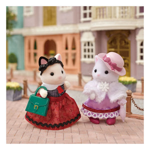 Sylvanian Families - Maleta de moda y hermana mayor Gata Persa