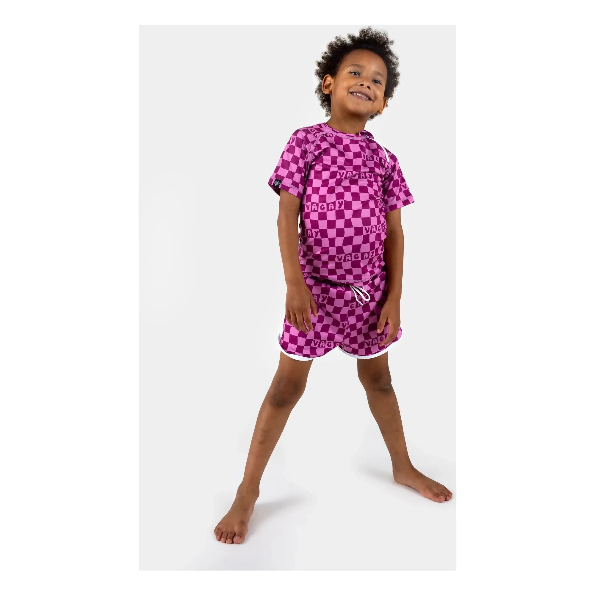 Beach & Bandits - Bañador tipo bermuda con estampado tartán de fibras recicladas y protección UV | Fucsia