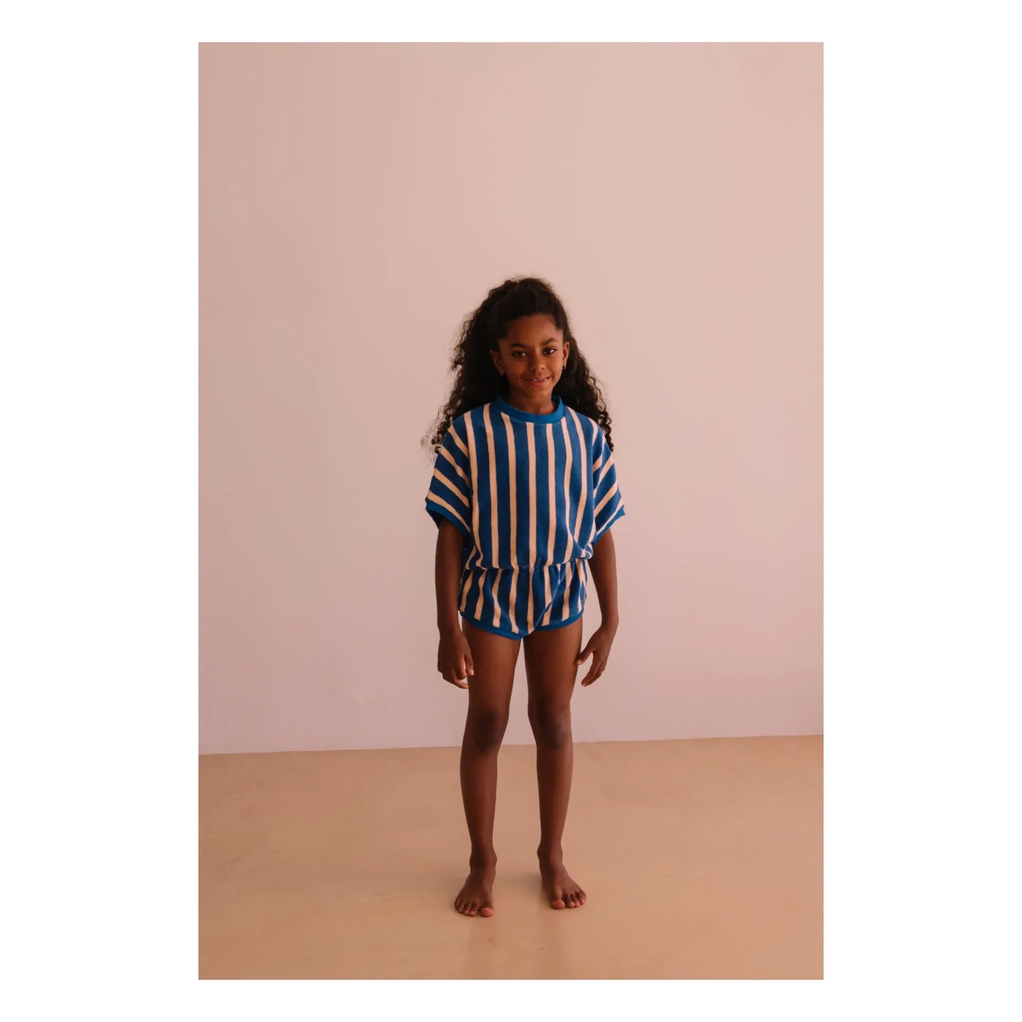 We Are Kids - Romy mameluco de toalla de algodón orgánico a rayas | Azul