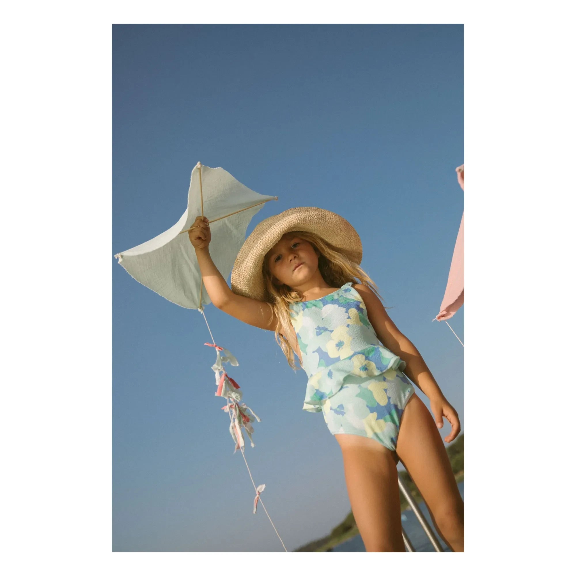 My First Cantê - Bañador con volantes texturizado y estampado floral de Winnie | Azul claro