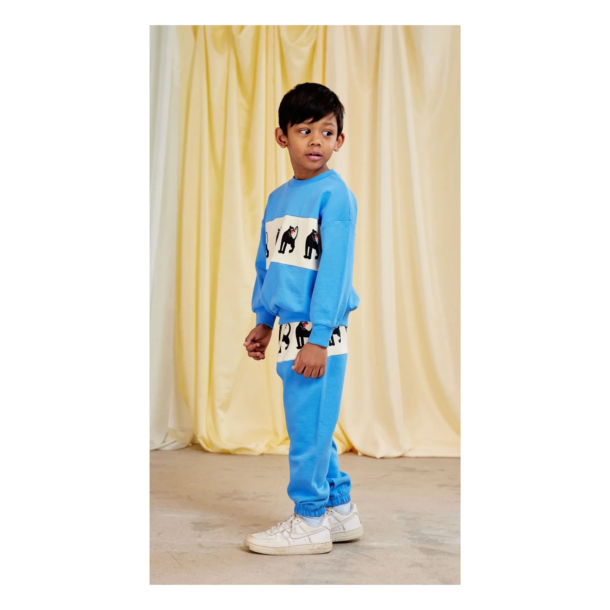 Mini Rodini - Sudadera de algodón orgánico con estampado de pantera | Azul celeste
