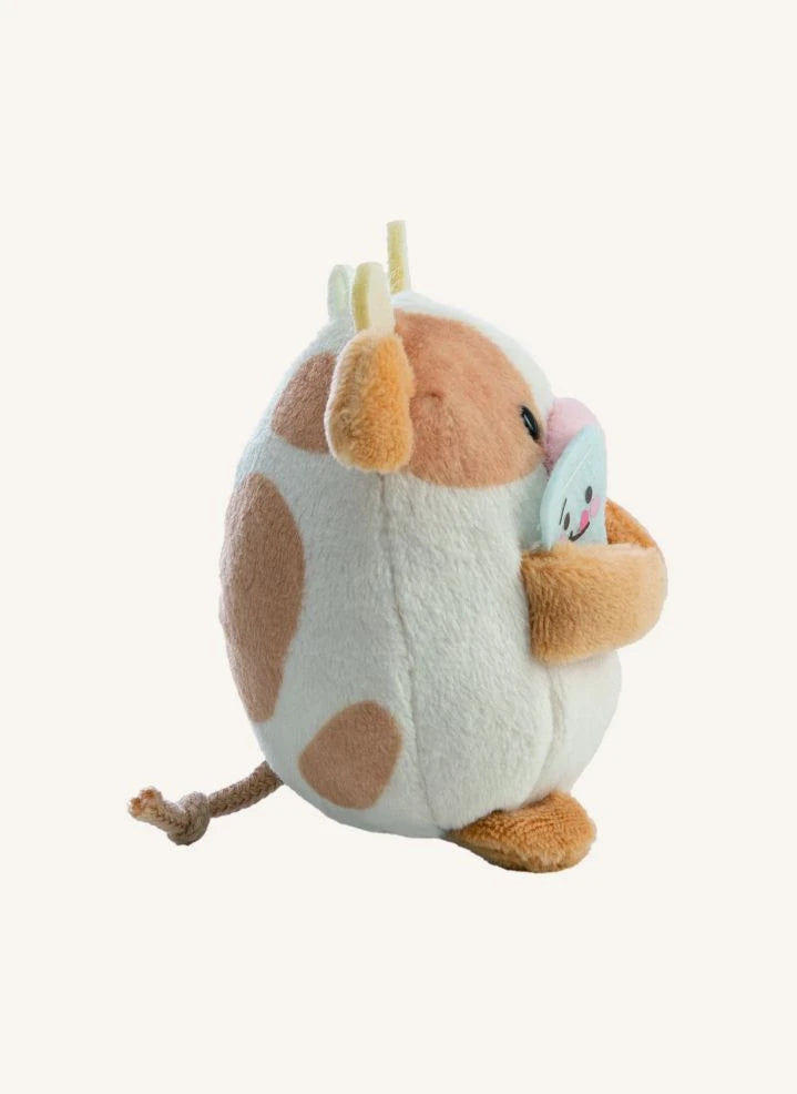 Nici - Juguete de peluche Moono la vaca, con disfraz de cartón de leche | Beige
